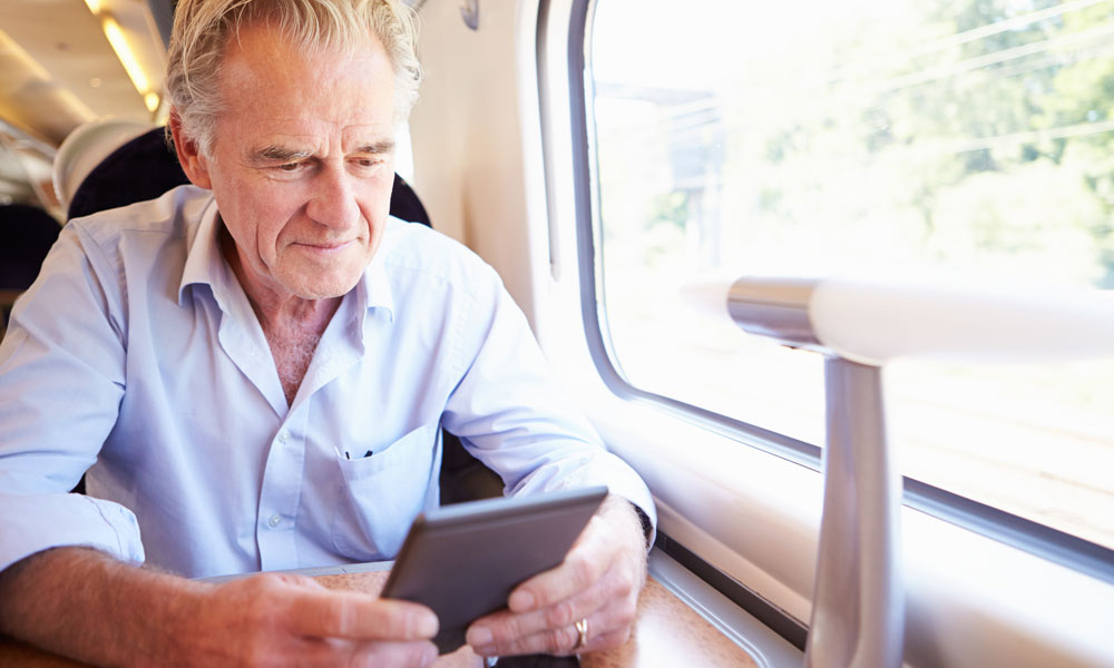 Older man on a train